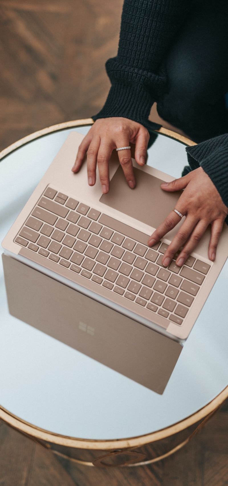 Person working on Surface laptop